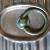 Old copper hot water bottle