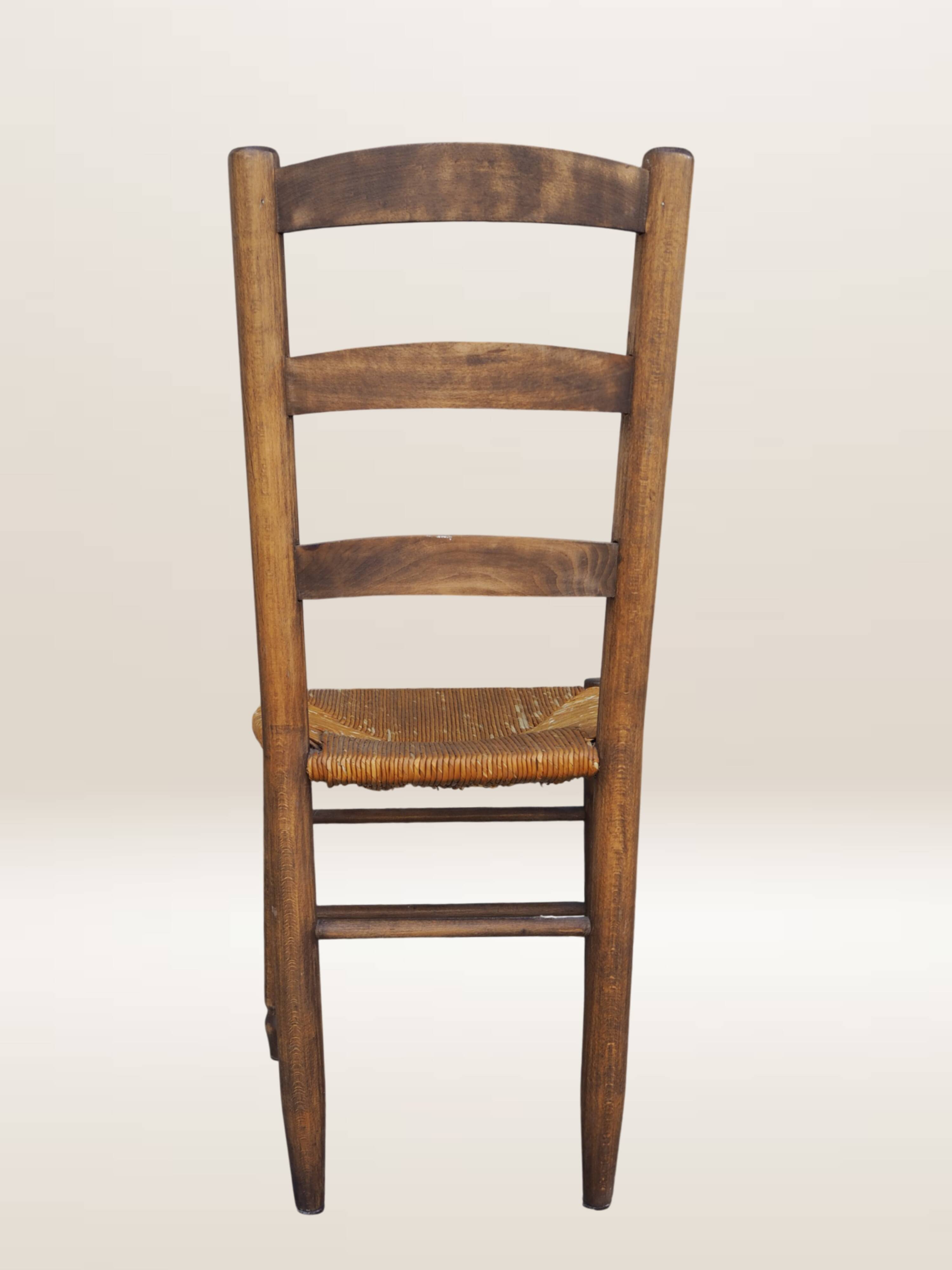 Set of six rush-seated ladderback chairs.