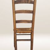 Set of six rush-seated ladderback chairs.