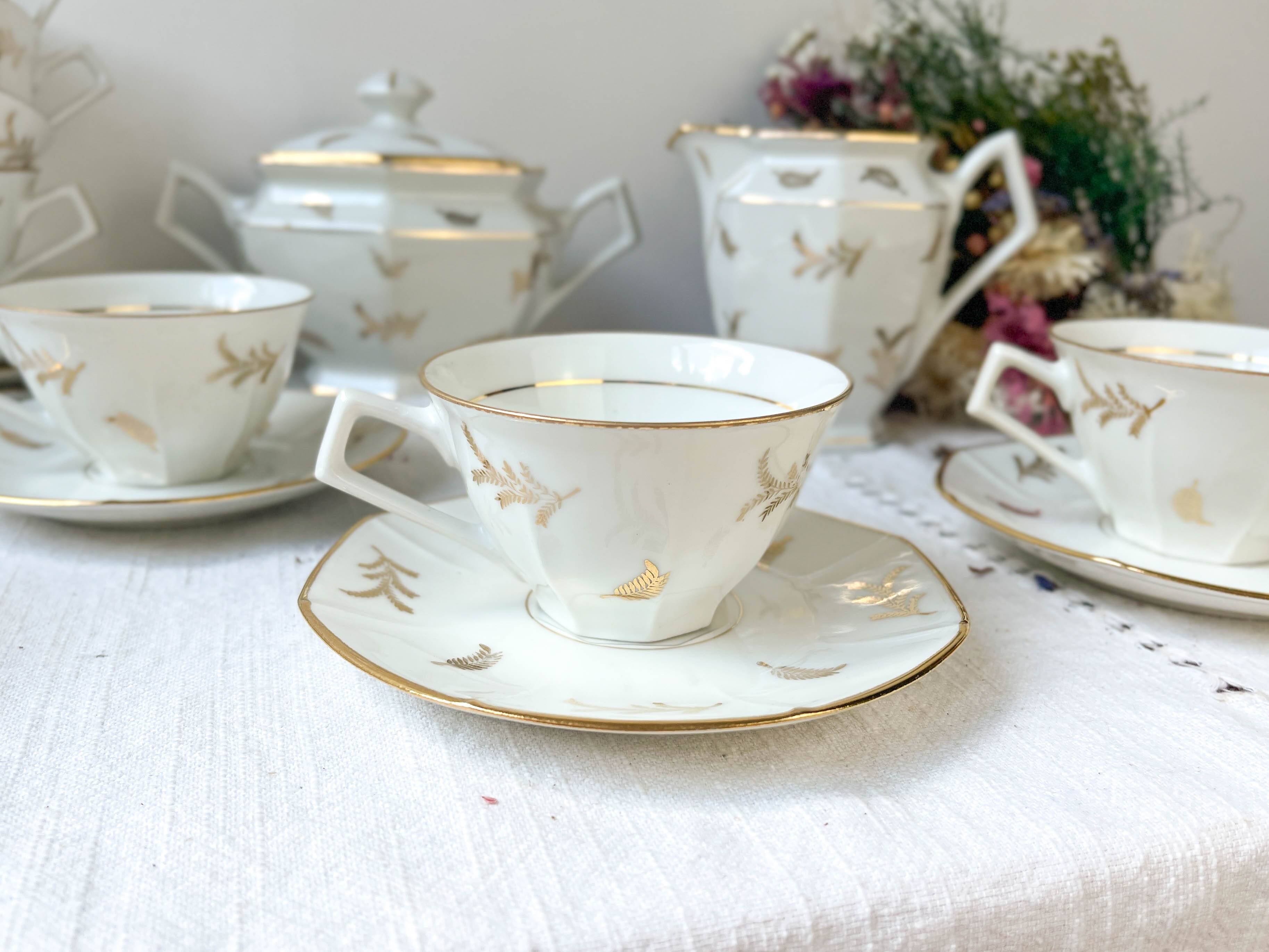 Vintage tea/coffee set in white porcelain with Limoges gold trim