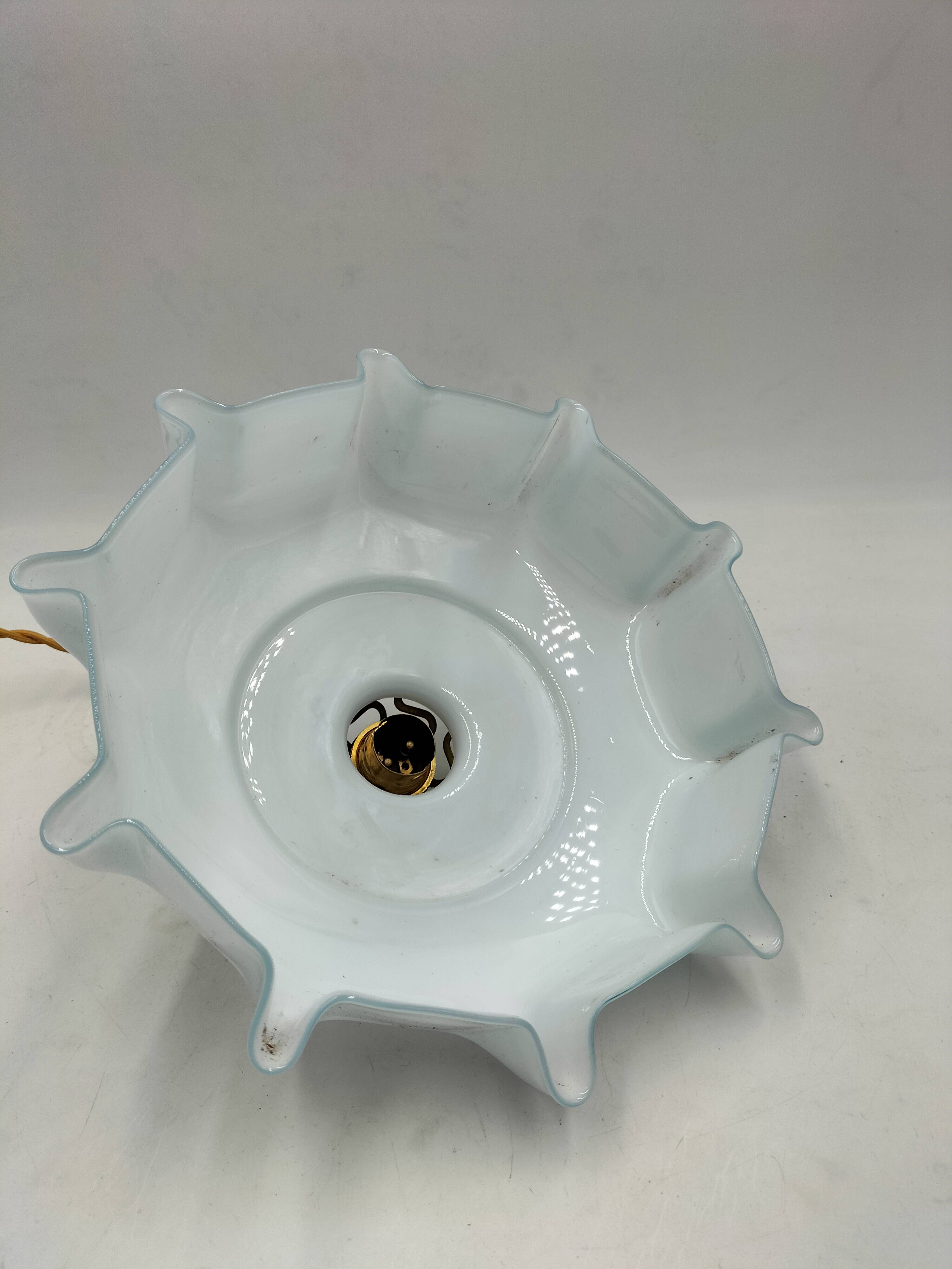 Blue opaline suspension