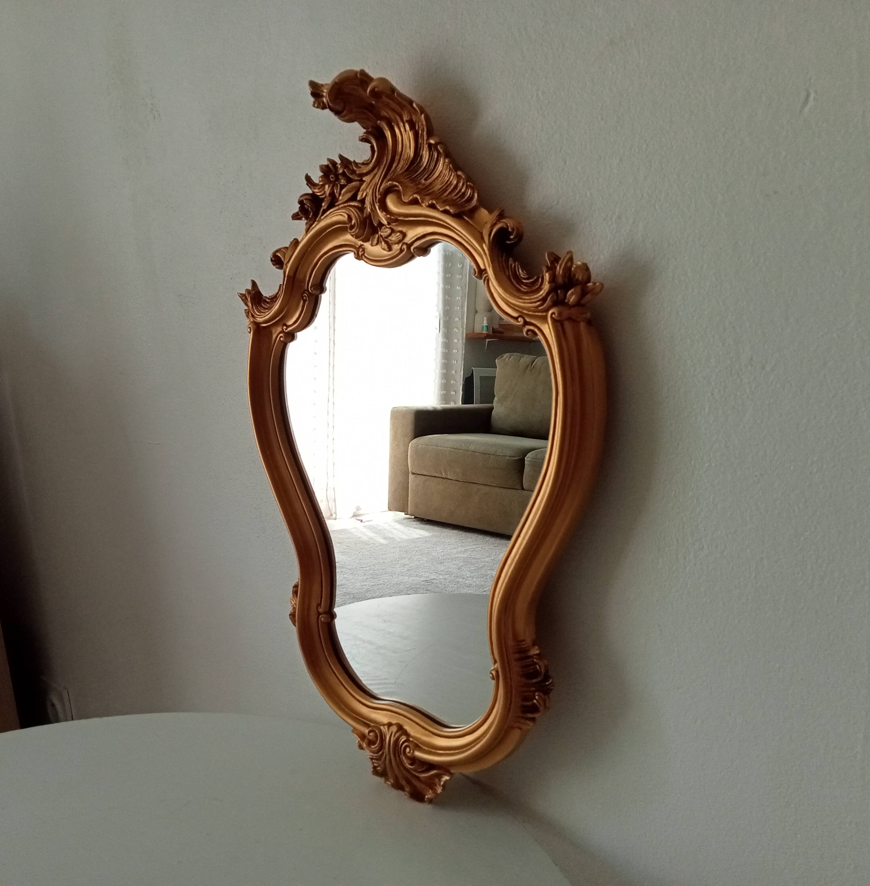 Vintage rococo mirror in gilded resin