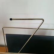 Vintage metal magazine rack in gold and black vinyl Newspaper holder