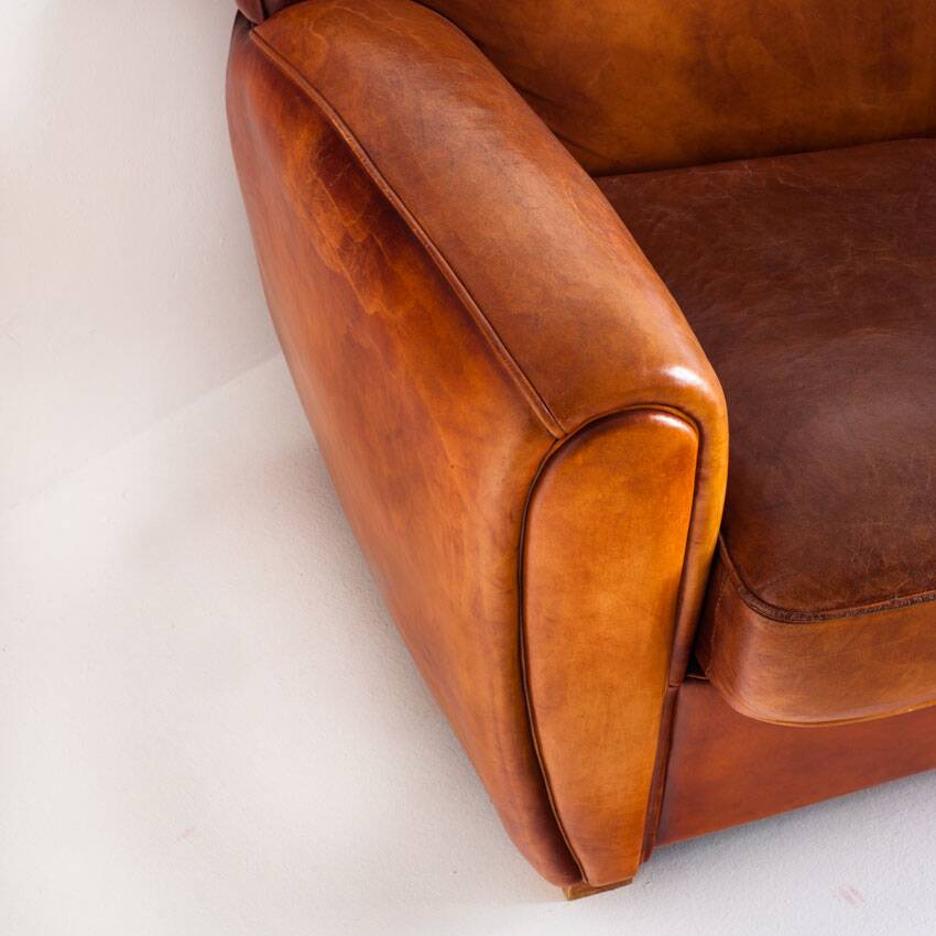 Vintage leather club sofa. Art Deco style. France, 1950s. (sofa convertible into bed)