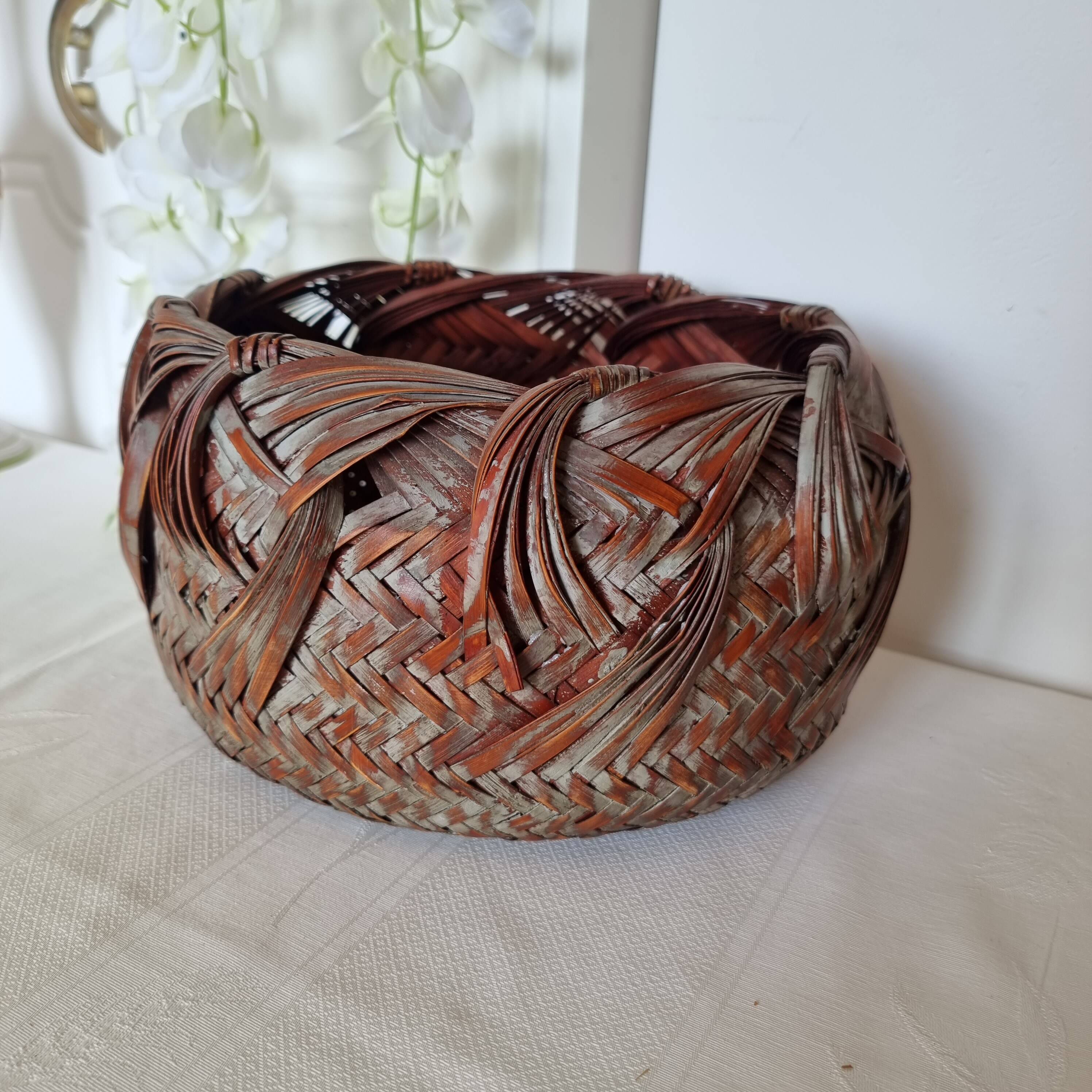 Vintage Japanese Ikebana basket made of smoked bamboo in natural