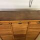 Old filing cabinet with triple curtains