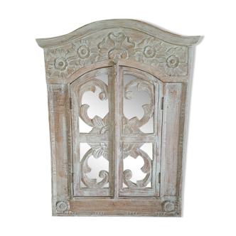 Carved white wood mirror 1990 decorative carved with opening shutters on a square mirror