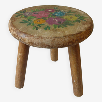 Old tripod stool with 3 wooden legs, painted floral decoration, flower bouquet