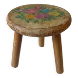 Old tripod stool with 3 wooden legs, painted floral decoration, flower bouquet
