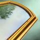 Large wall mirror in gilded resin – neoclassical style – 1970s