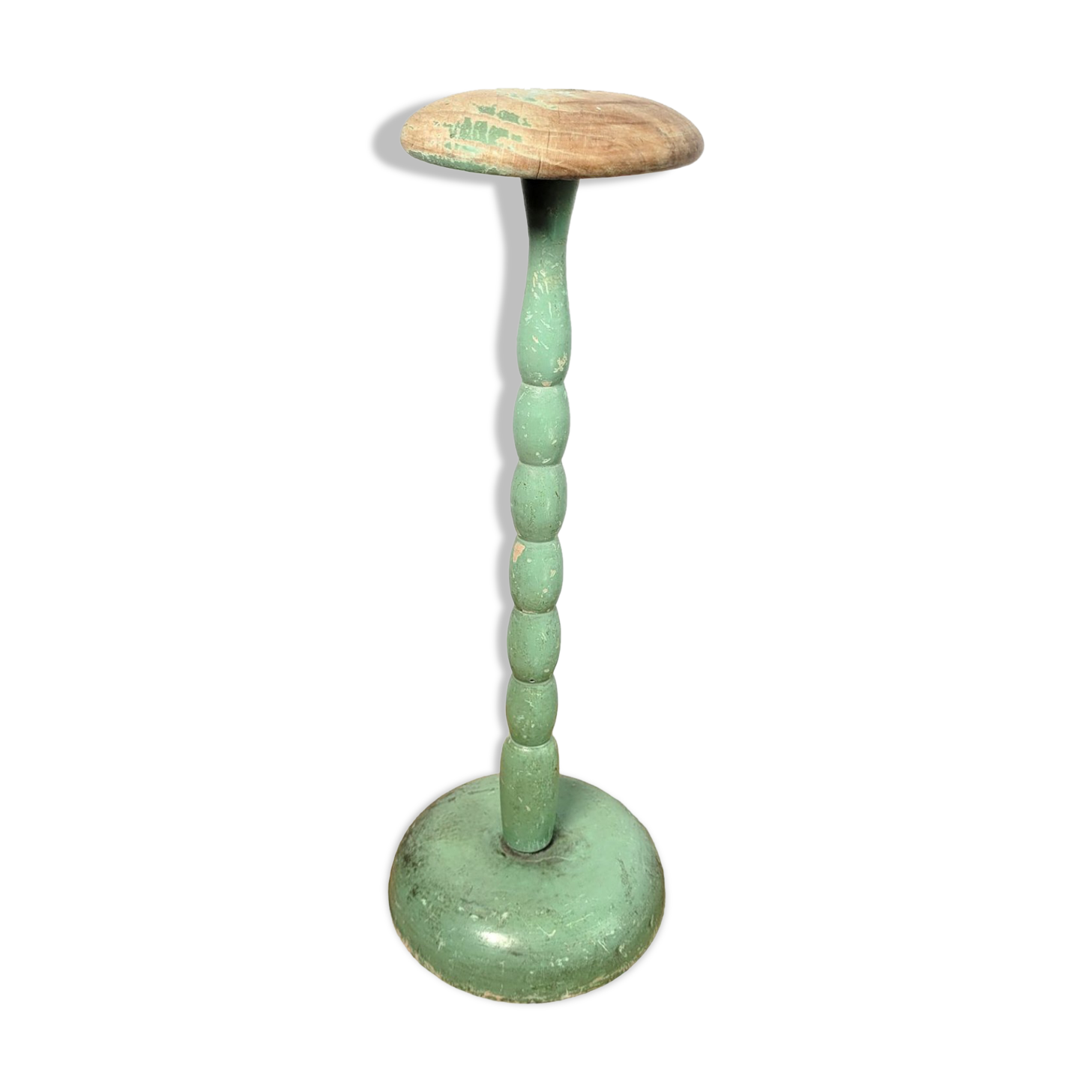 Old green hat holder