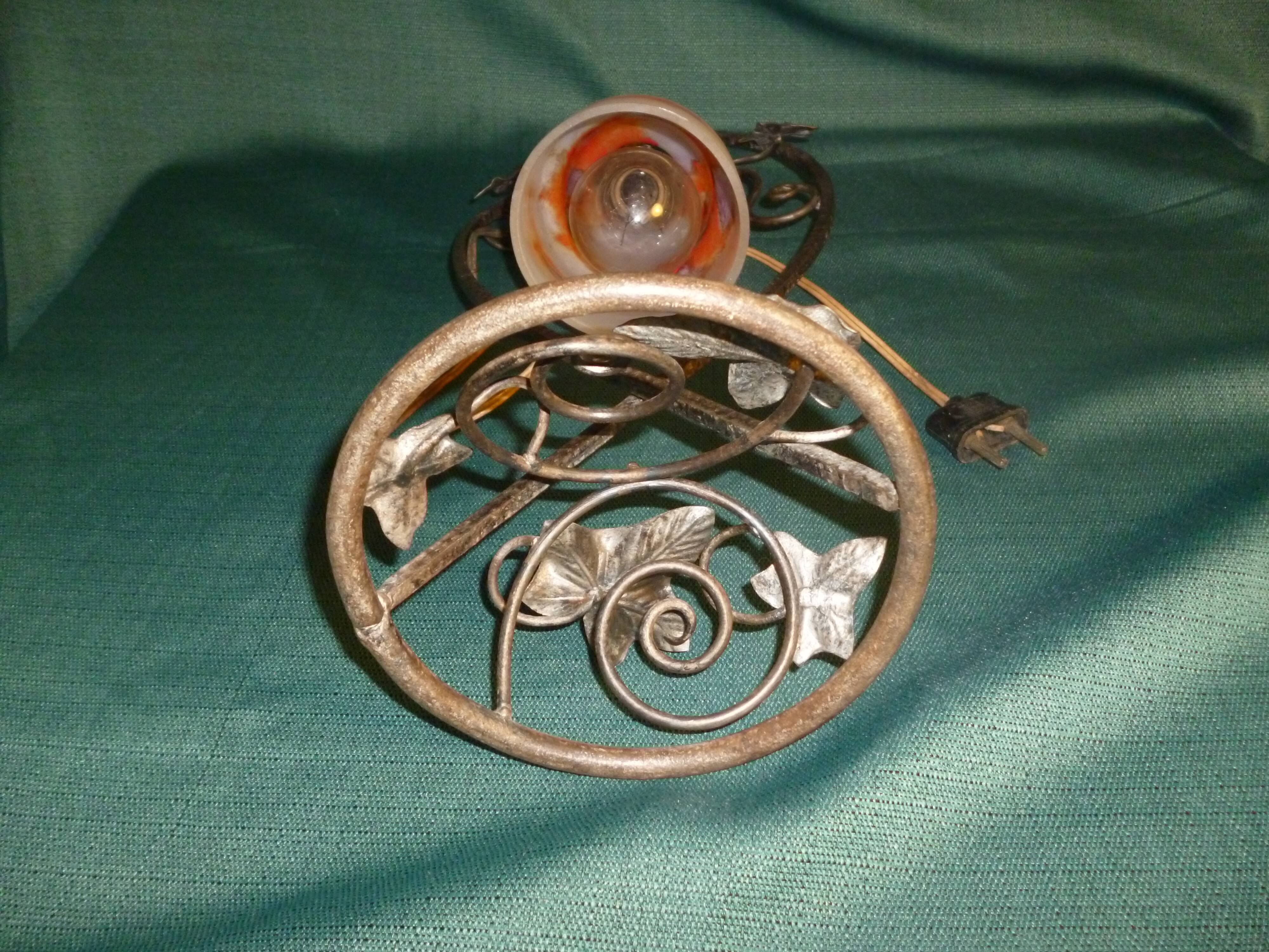 Art Deco lamp in glass paste and wrought iron leaves