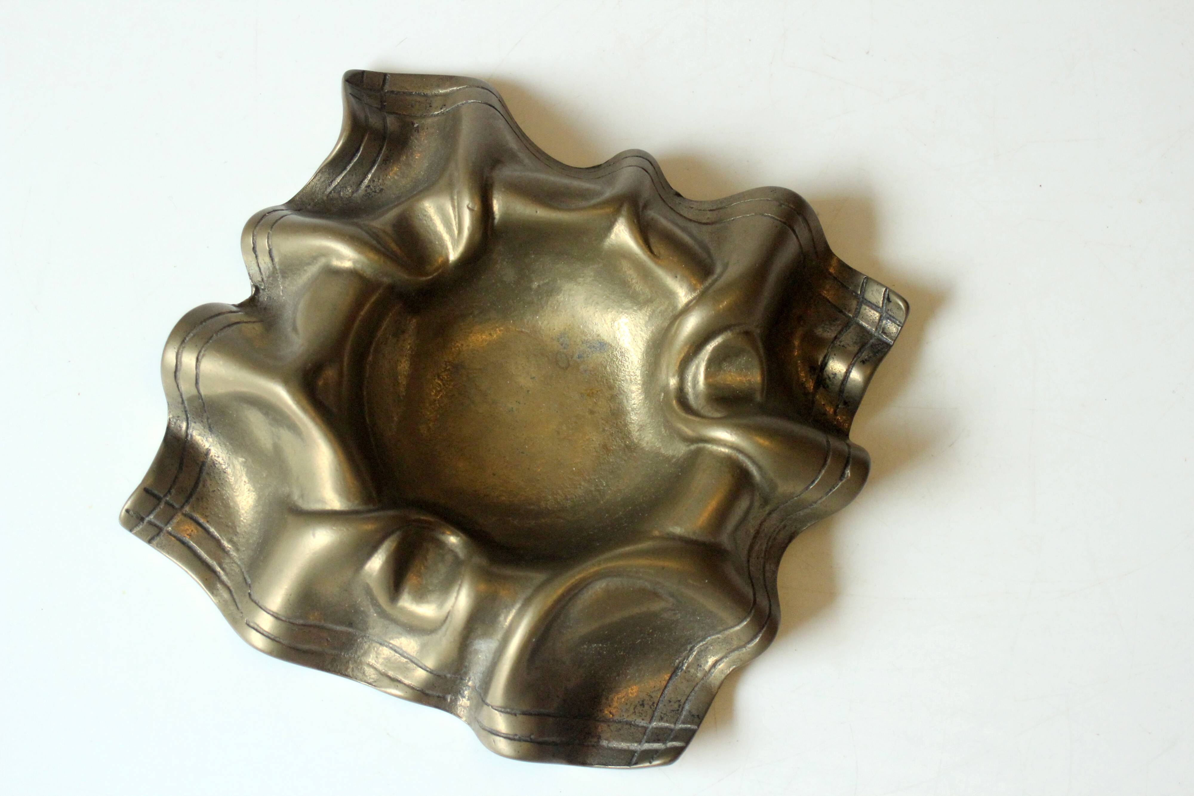 Solid brass ashtray, vintage from the 1950s