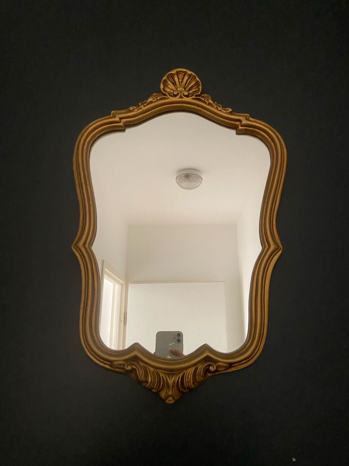 Golden baroque mirror