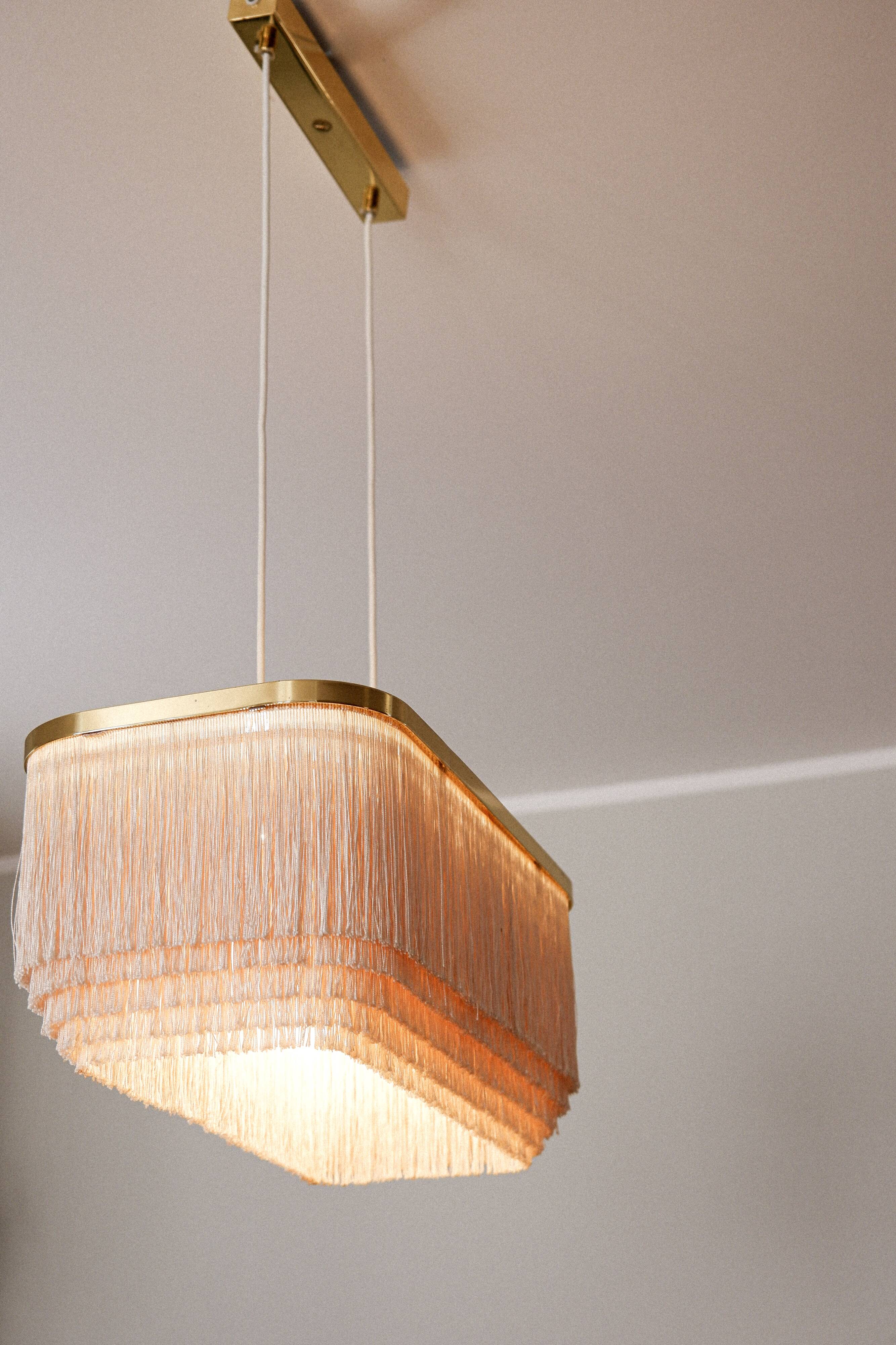 Hans Agne Jakobsson Silk fringe & brass pendant model T607, circa 1960.
