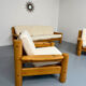 Set of 2 armchairs in solid pine with boucle fabric, 1970s Scandinavian design.