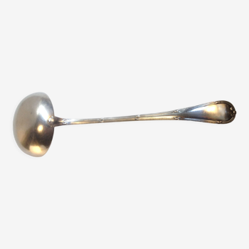 Christofle ladle in silver metal, crossed ribbons model