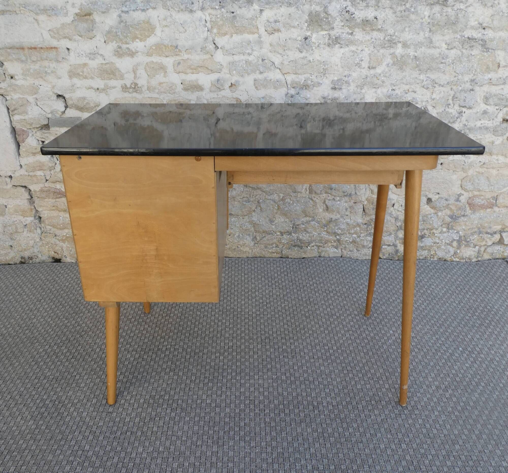 Baumann desk in light wood and black Formica, around 1960.
