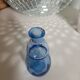 Small blown blue glass bottle