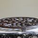 Brown enamelled cast iron trivet