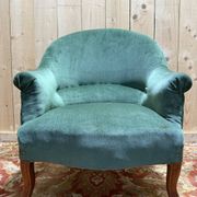 Napoleon III period crapaud armchair in green velvet.