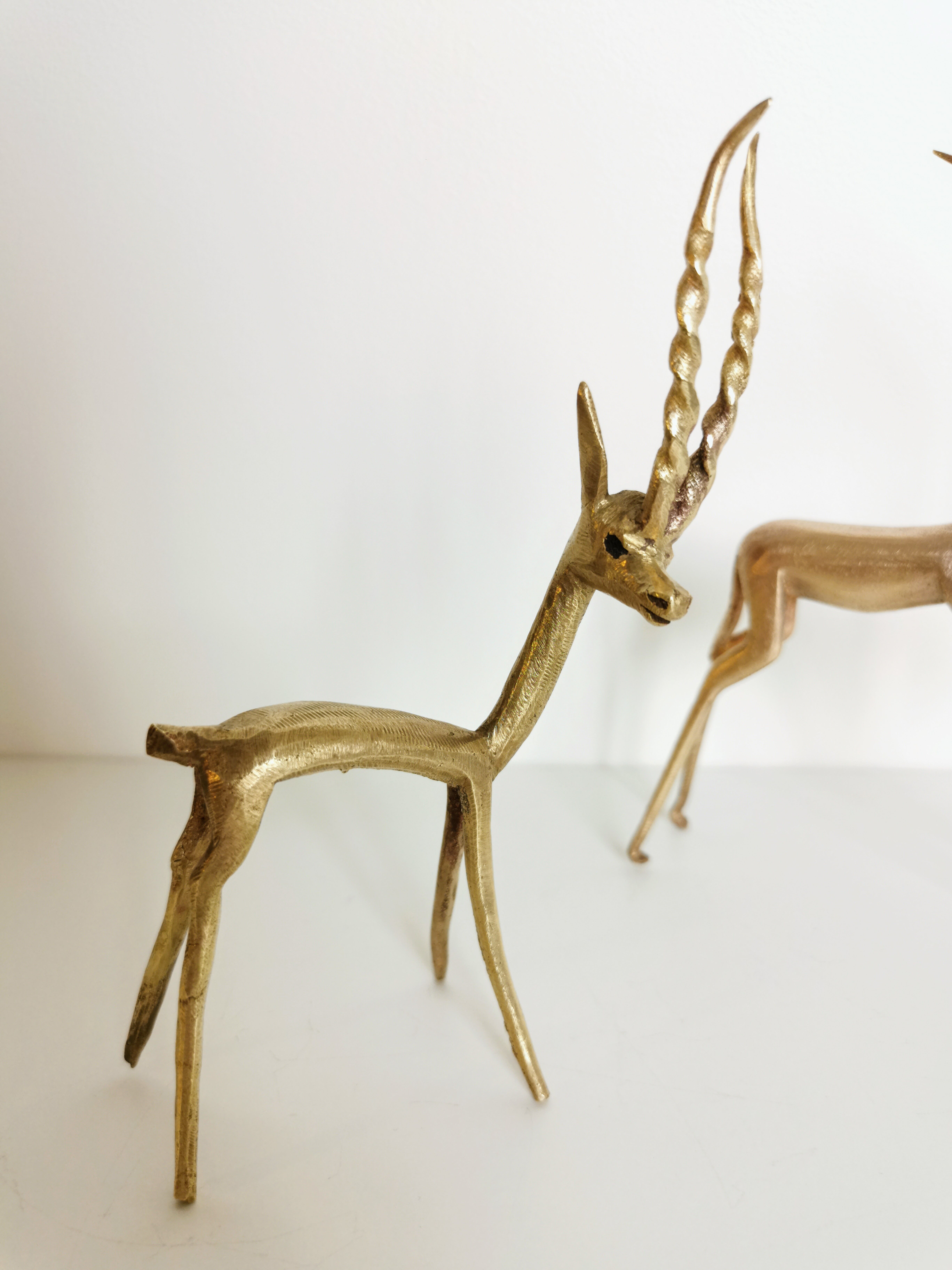 Trio of brass antelopes