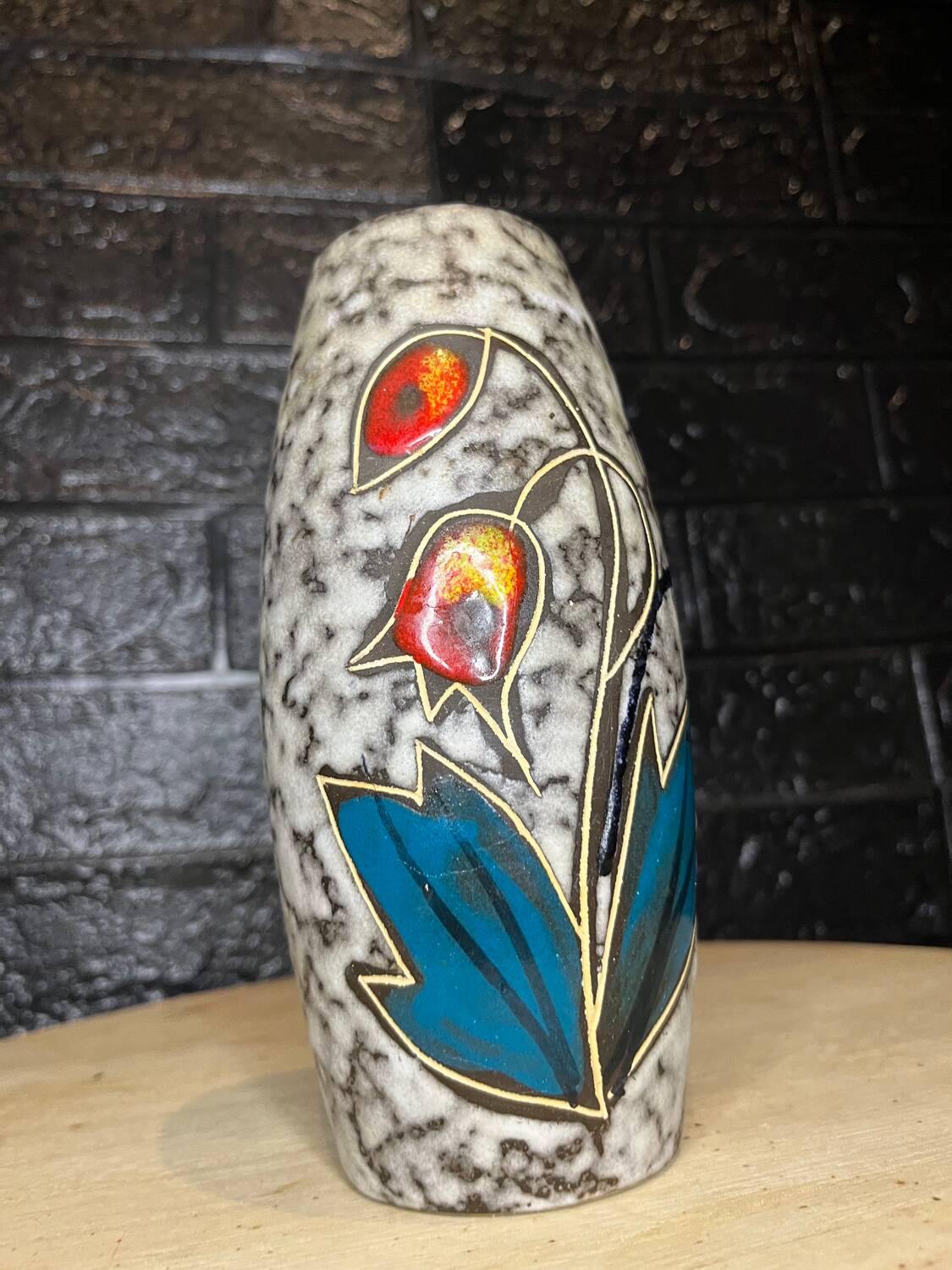 Ceramic vase with flower decor