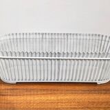 White perforated sheet metal planter by Mathieu Mategot