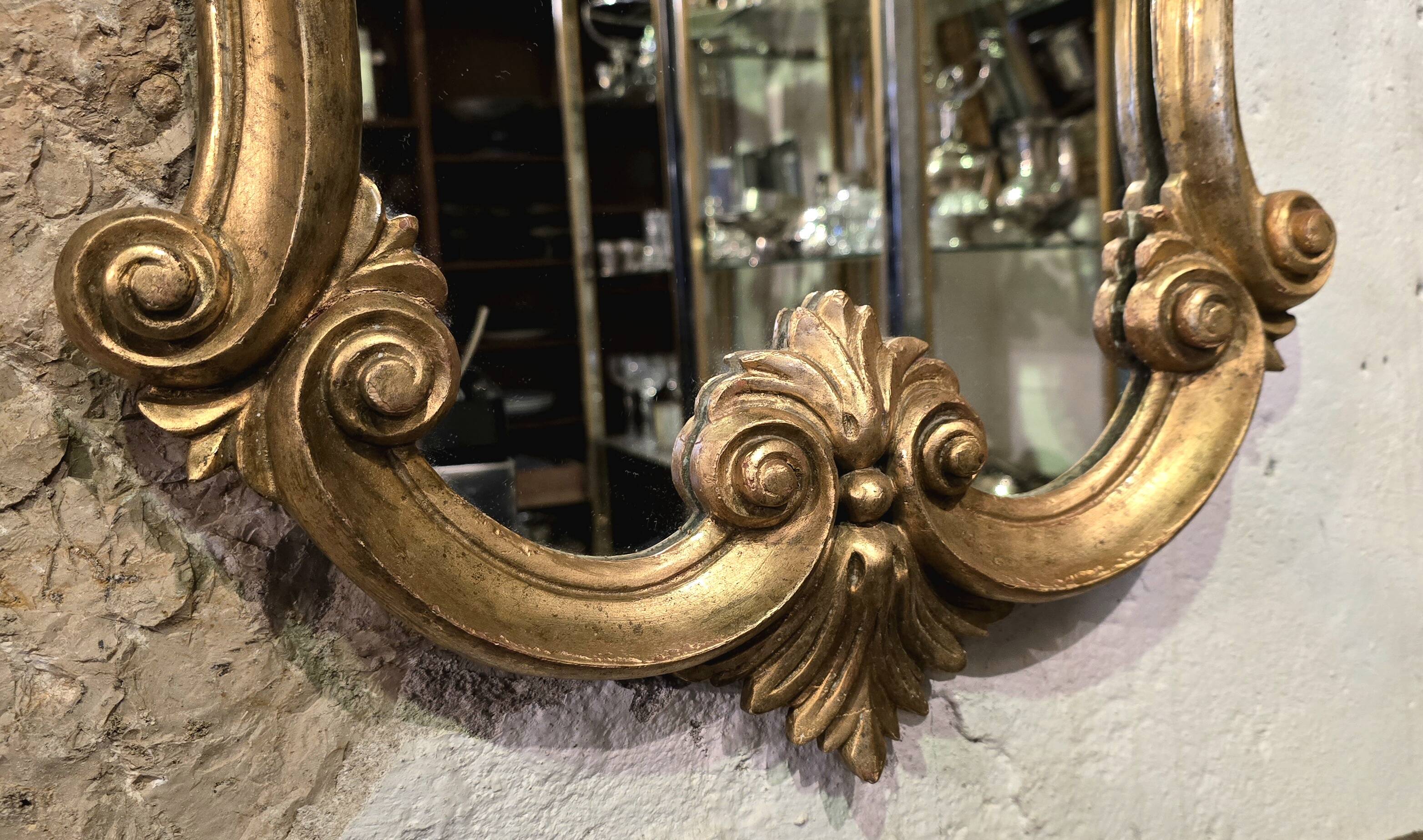 Carved and gilded wooden mirror, Louis XV style - 94 cm