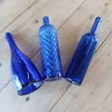 3 blue bottles