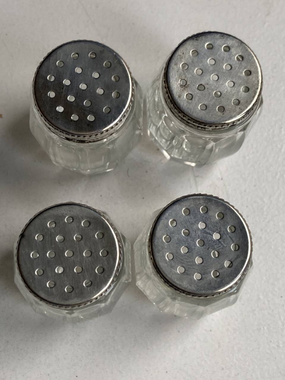 Set of hallmarked silver and fluted domed glass salt/pepper shakers