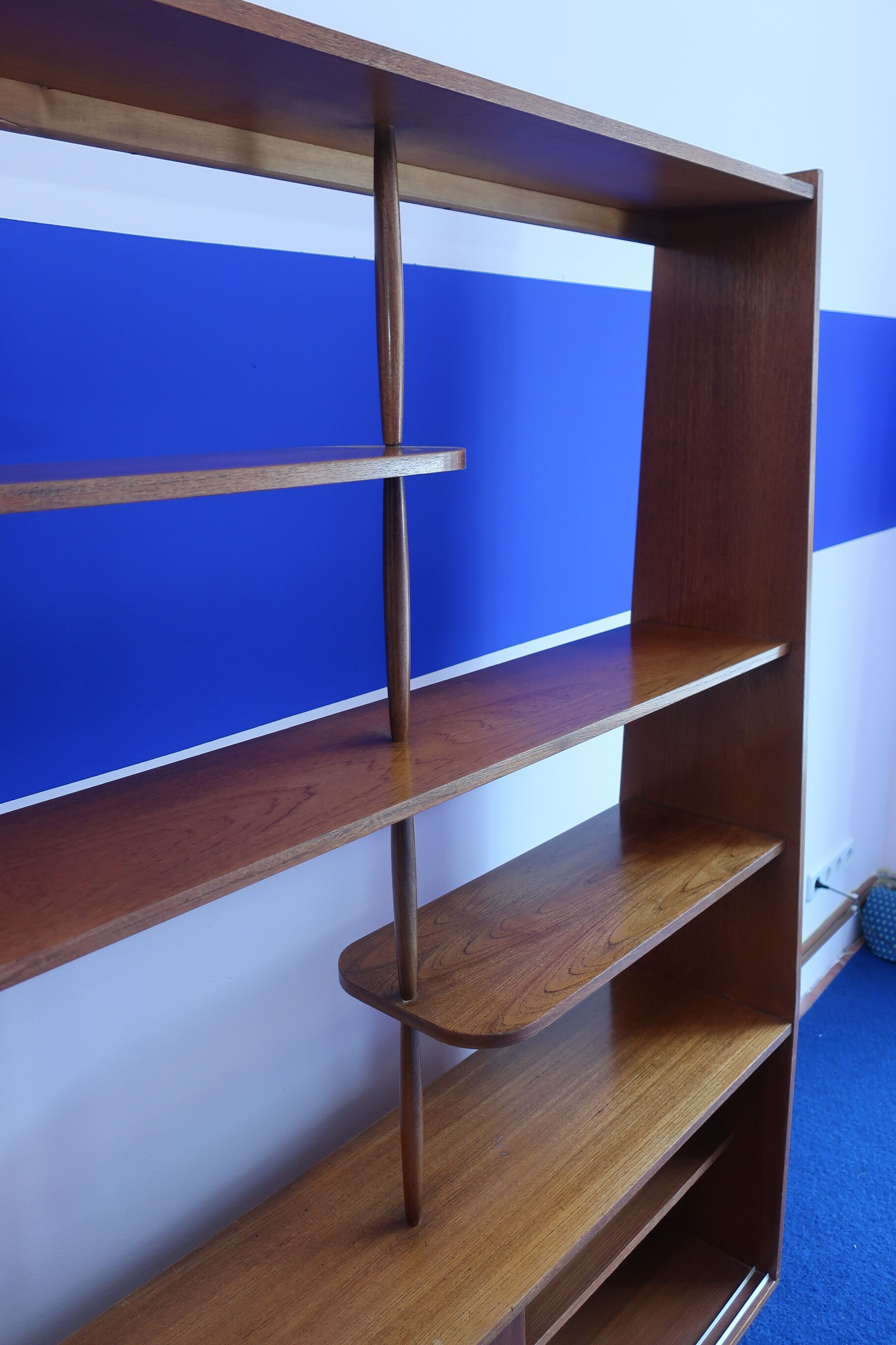 Library separator of 60s teak pieces