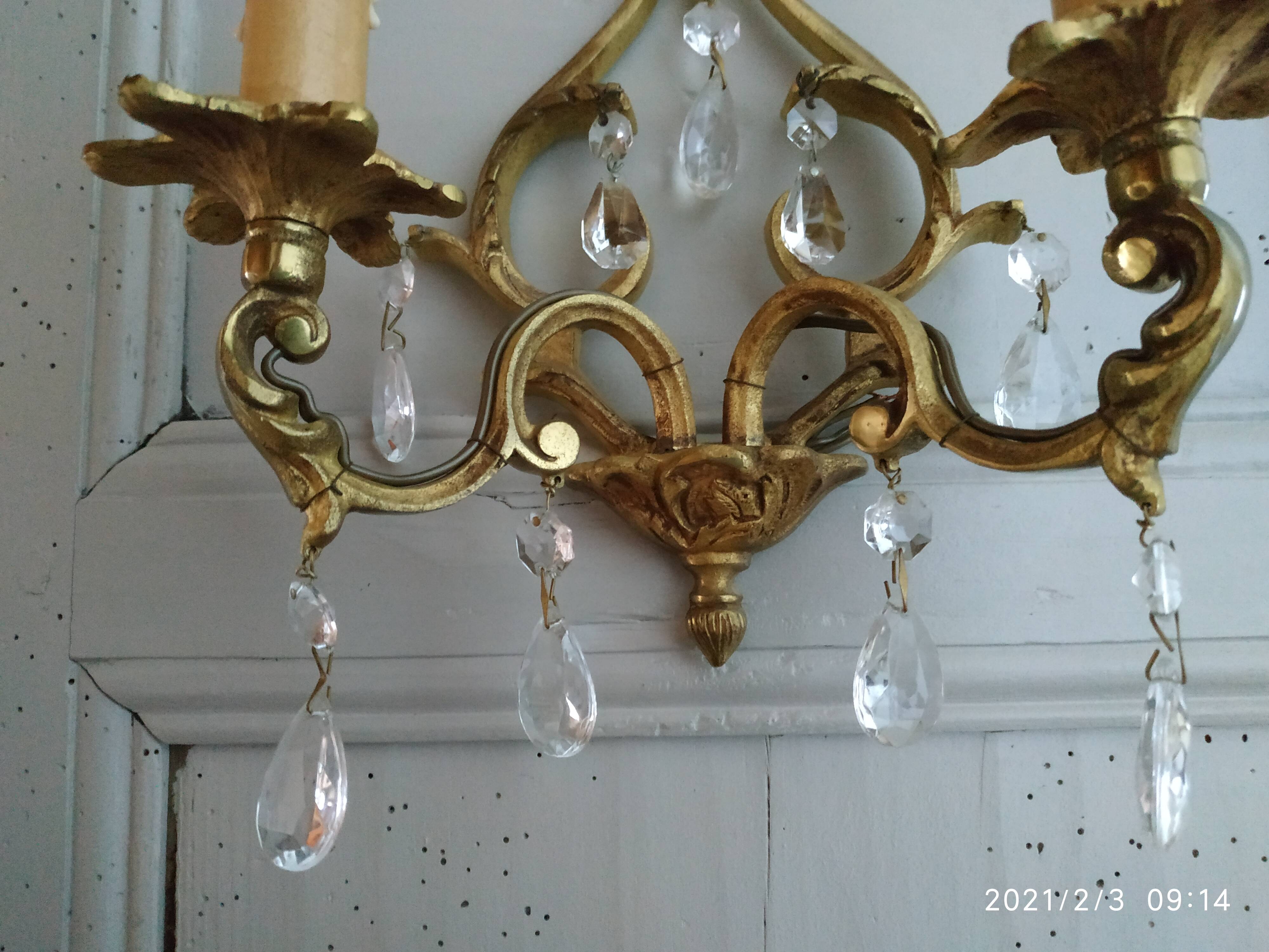 Bronze and stamps sconce