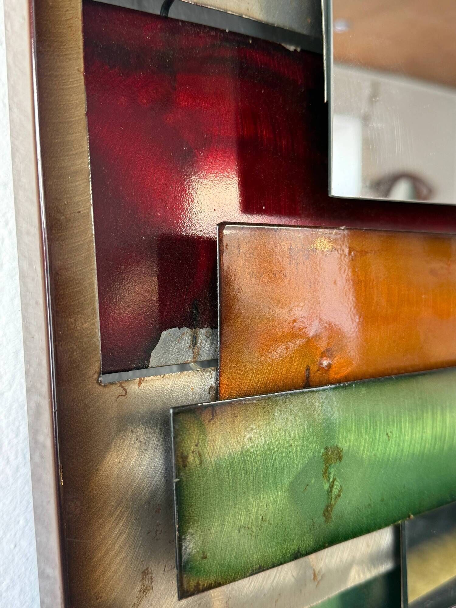 Large metal "polychrome" mirror — 1970s