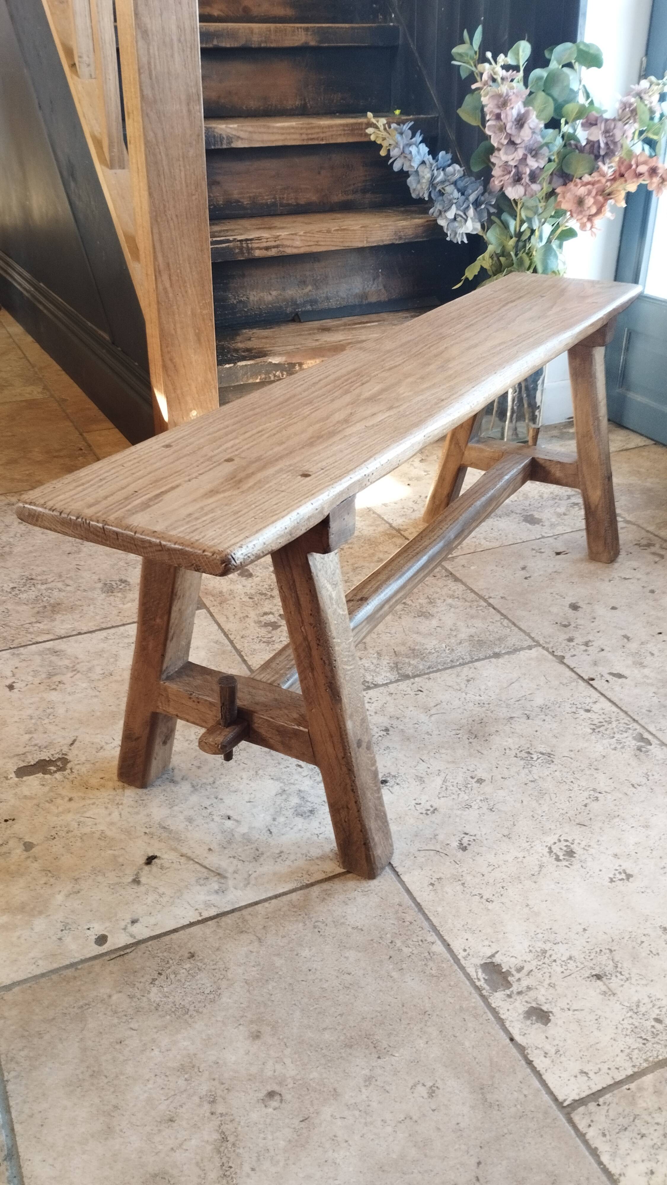 "A frame" bench in solid oak, patinated.