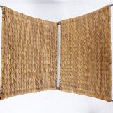 Chrome metal magazine rack with woven banana leaves