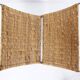Chrome metal magazine rack with woven banana leaves