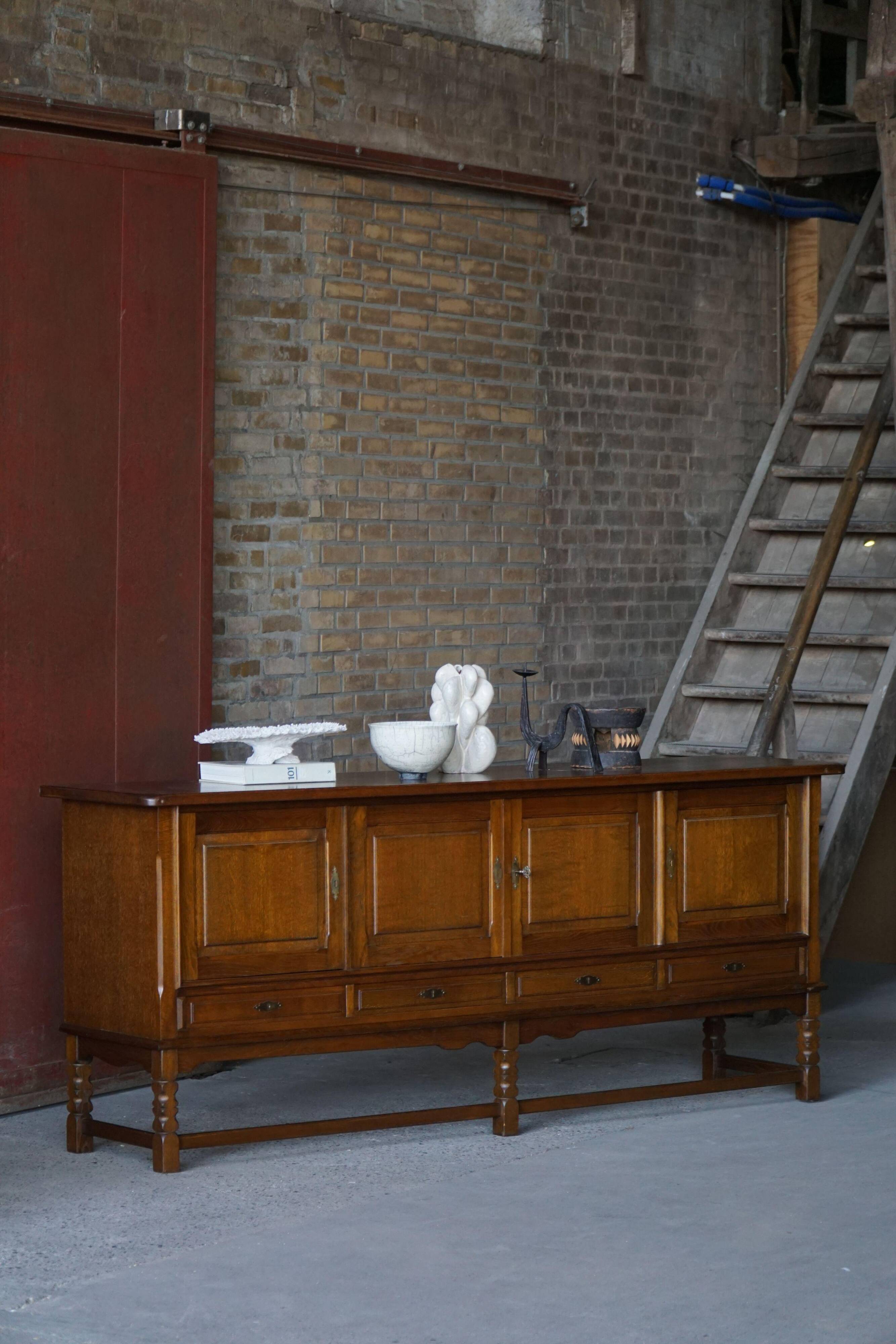 Danish enfilade from the mid-modern century in dark stained oak, 1960s.