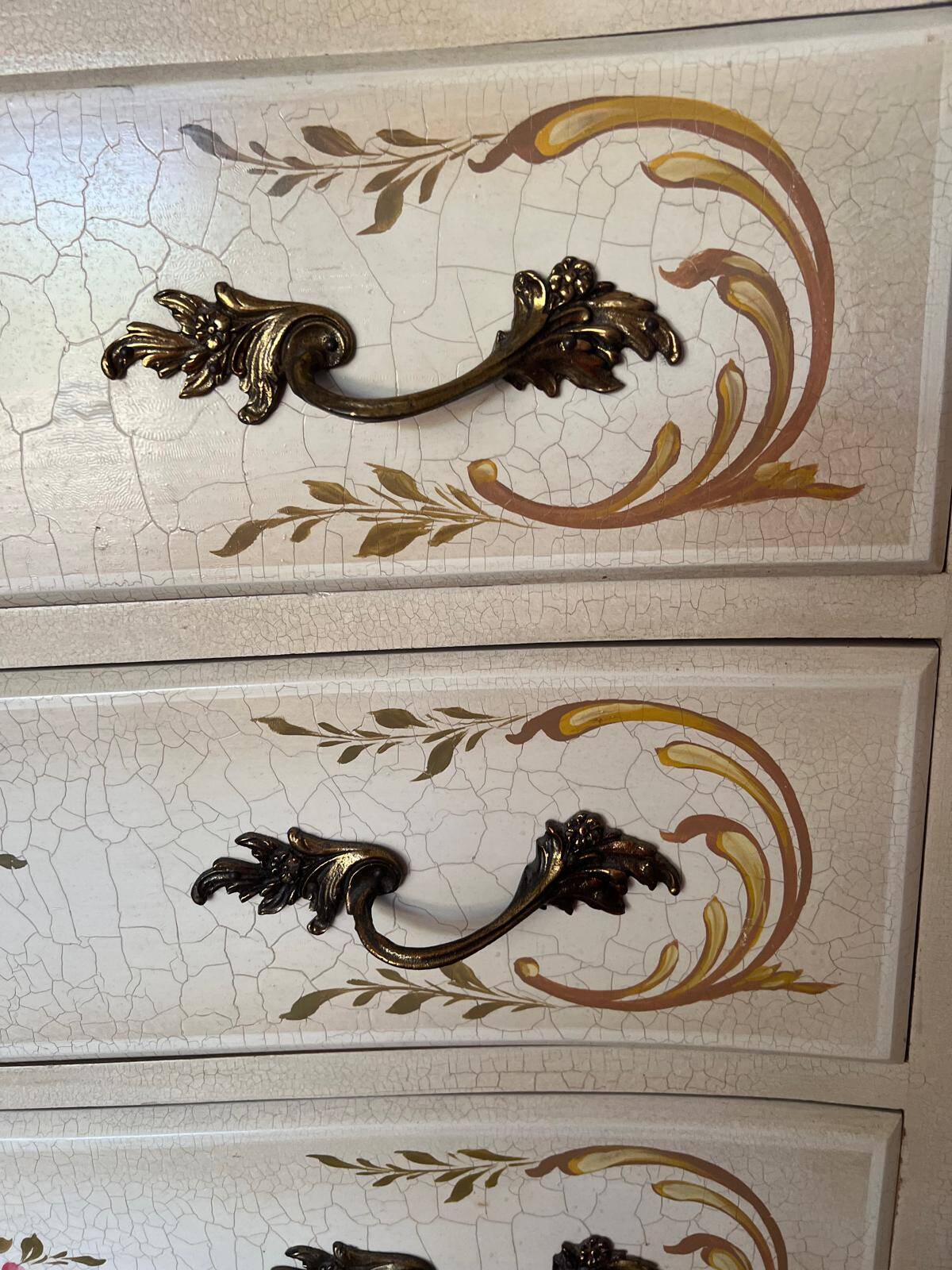 Curved Louis XV style commode in marble with painted floral decoration.