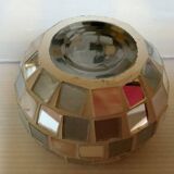 Four mosaic mirror and mother-of-pearl candle holders.