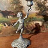 Old cherub candle holder