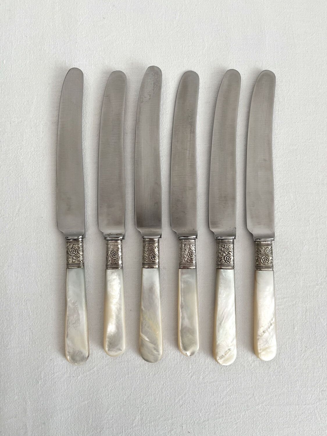 6 antique mother-of-pearl and silver-plated metal knives