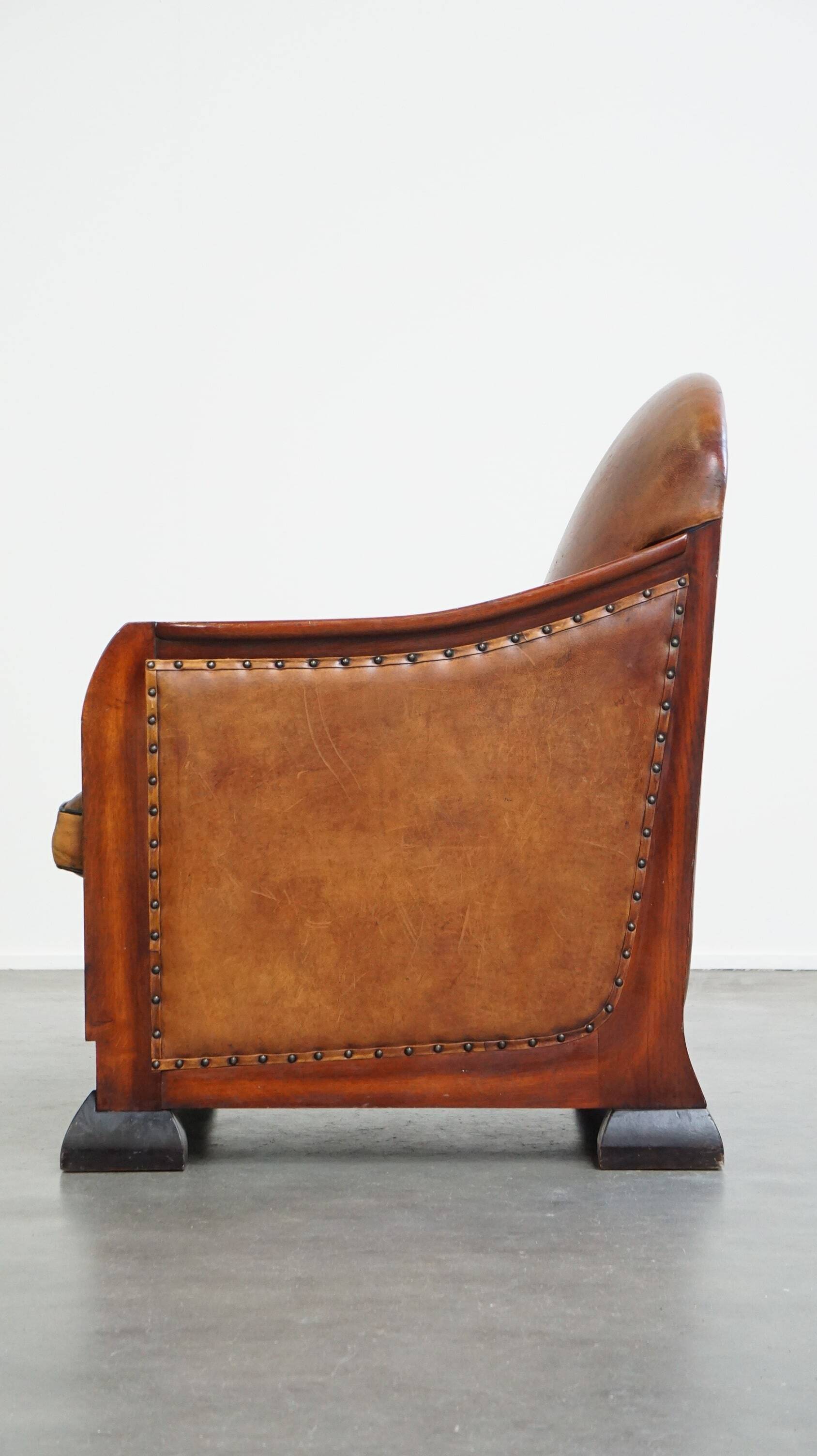 Unique, stately, comfortable sheepskin Art Deco design armchair