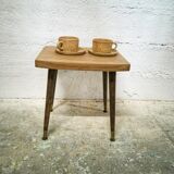 Side table with compass legs