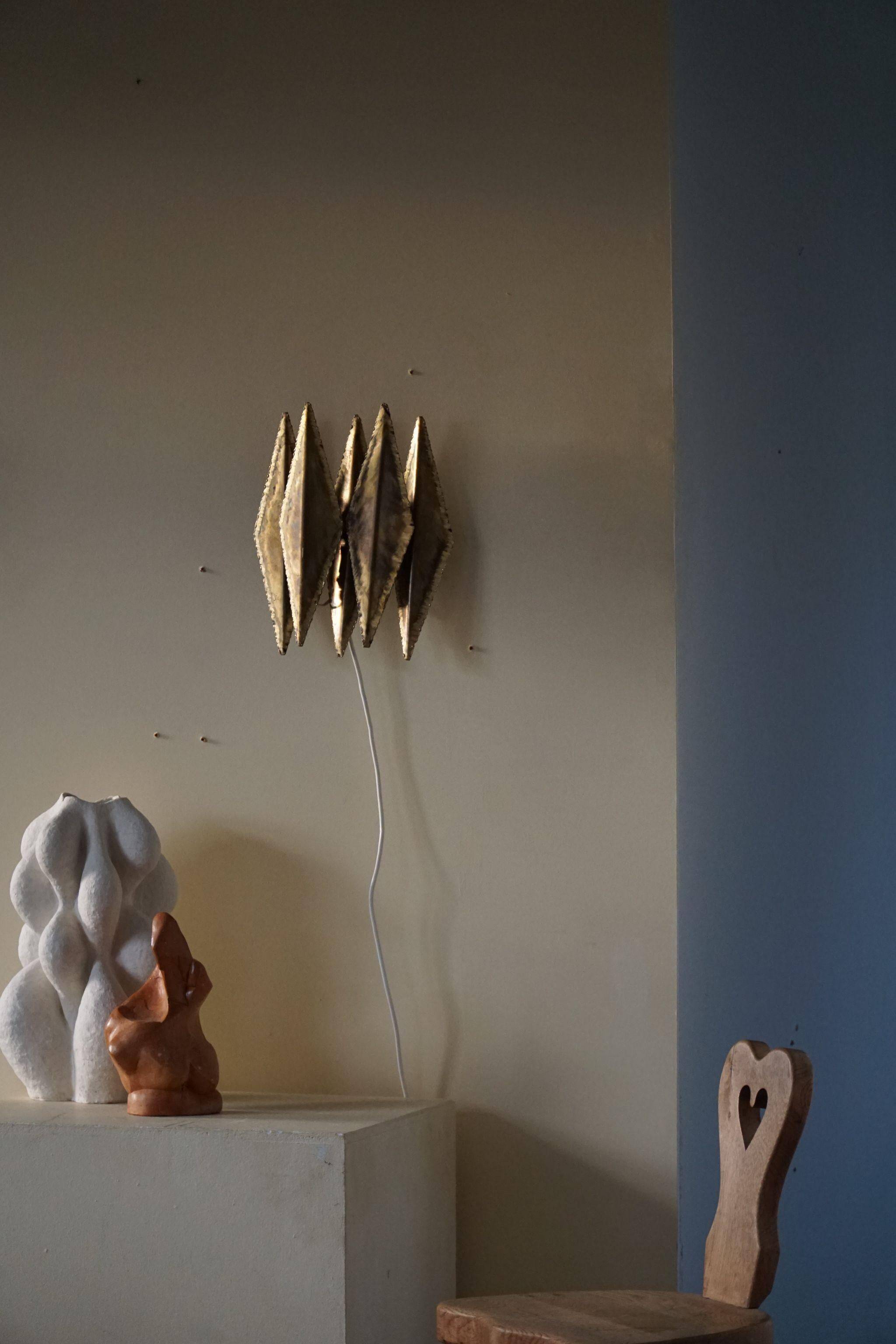 Brutalist wall lamp in brass by Svend Aage Holm Sørensen, 1960s.