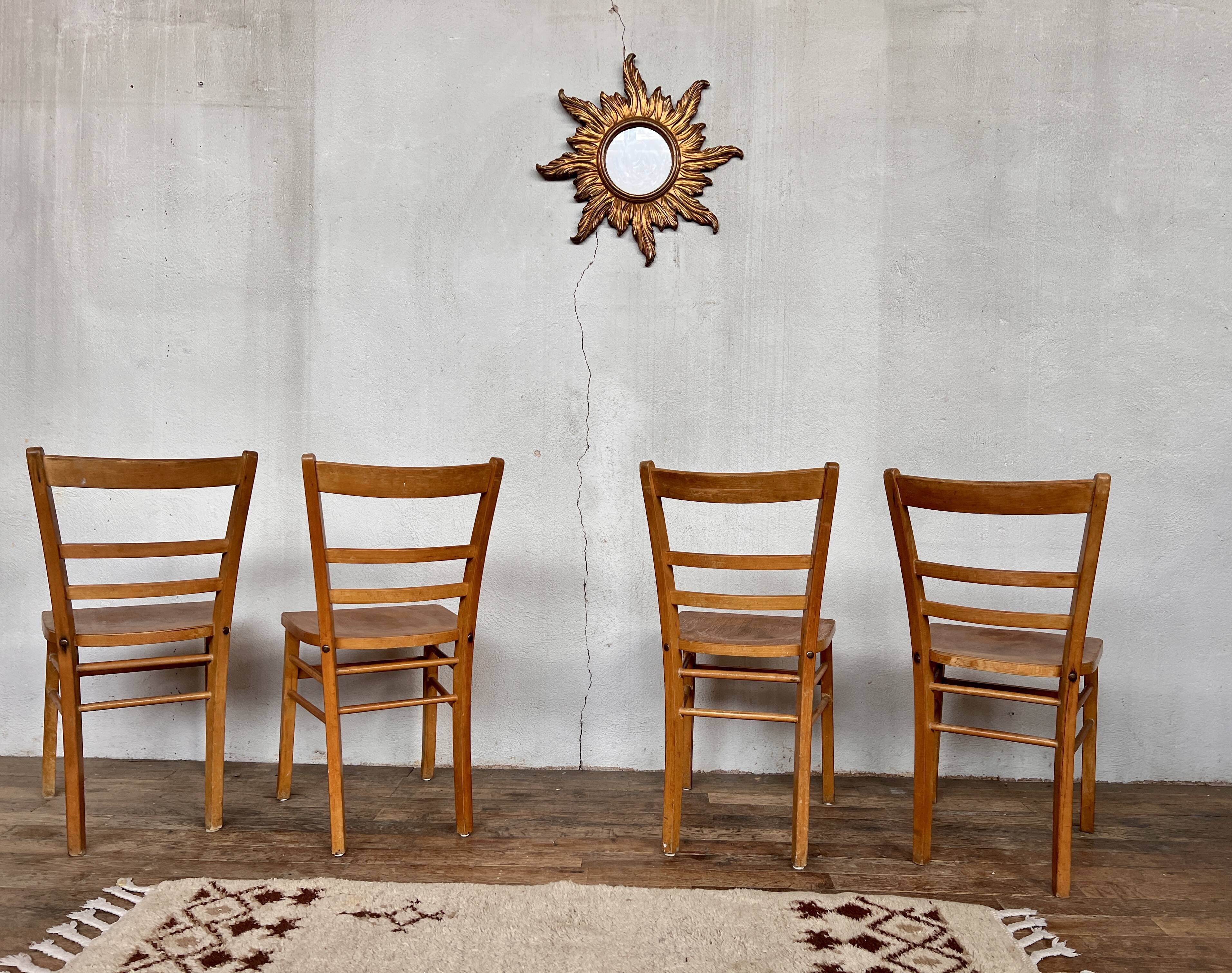 Series of 4 vintage light wood bistro chairs