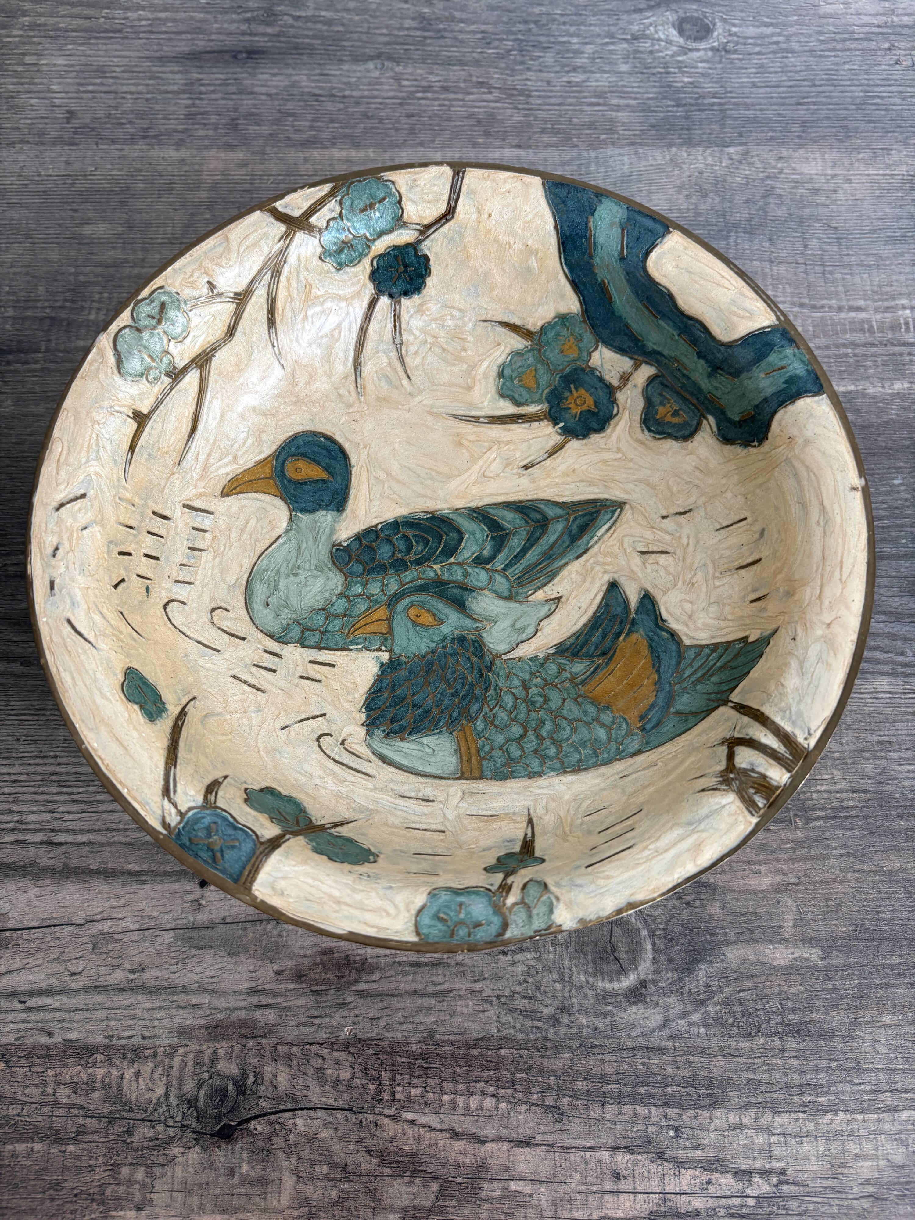 Antique enamelled brass cup