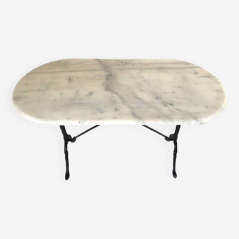 Oval marble and cast iron bistro table