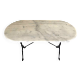 Oval marble and cast iron bistro table