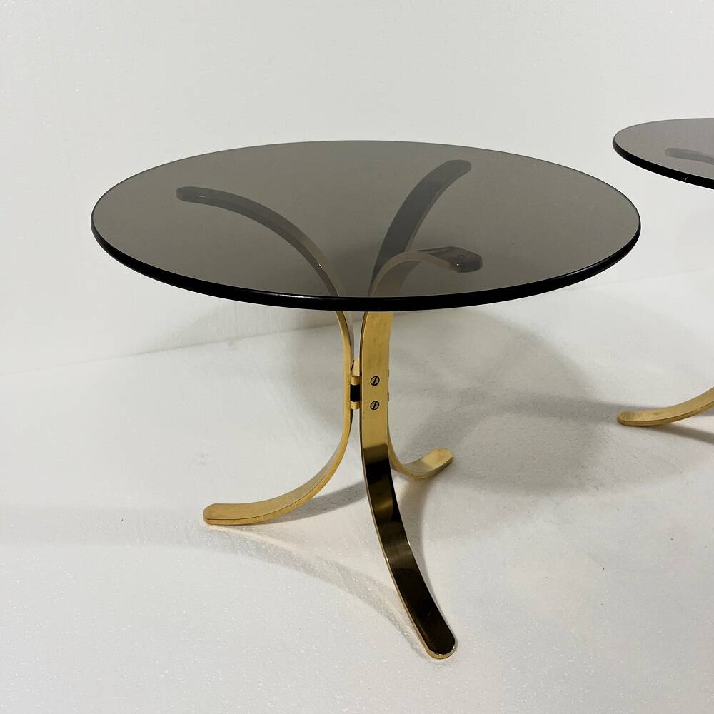 Brass and smoked glass side tables from the 1960s.